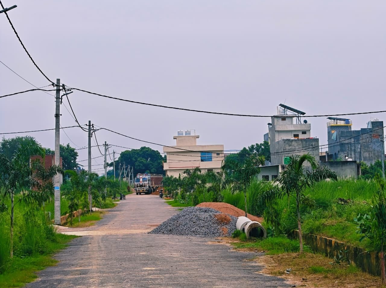 Drainage pipes being laid along society road at Dauwa Green City
